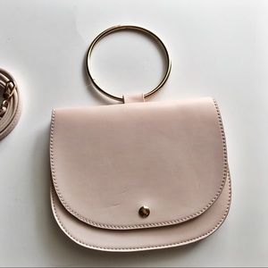 purse with bracelet handle